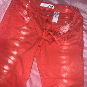 Orange tie dye jeans